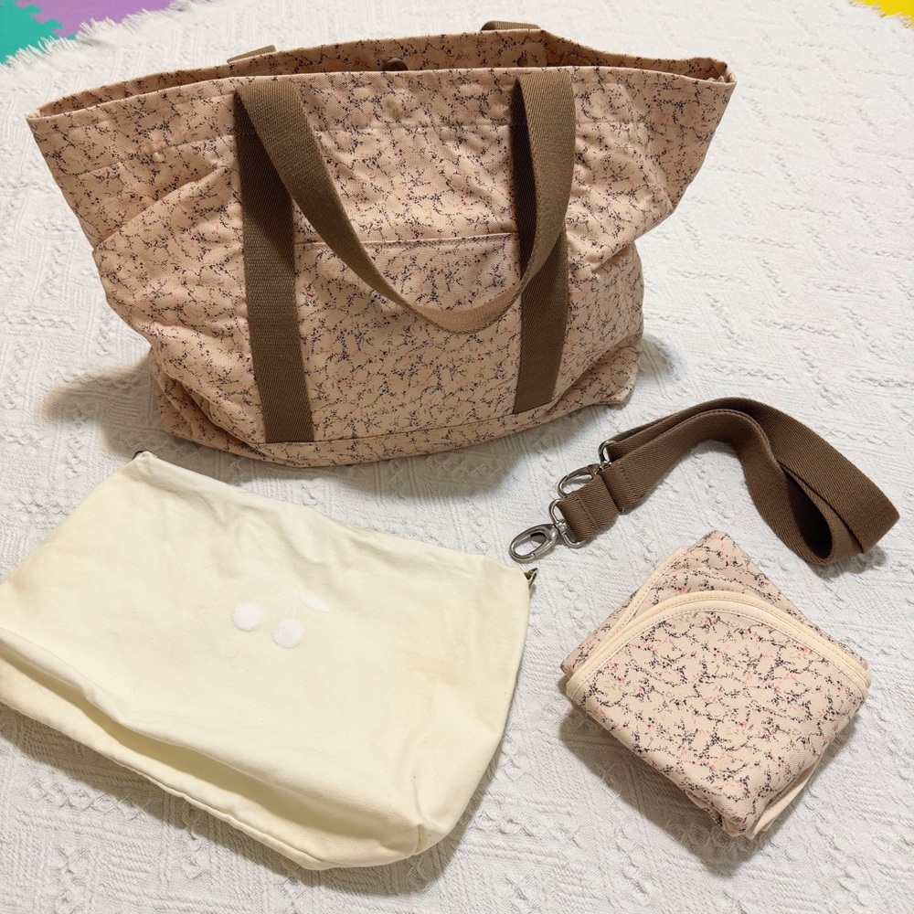 Bonpoint diaper bag with diaper pad and pouch